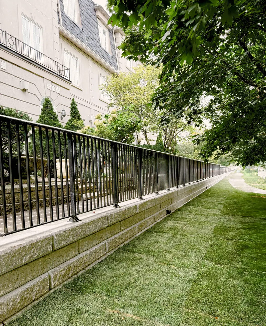 A retaining wall installed for a commercial client by Mutti Landscaping