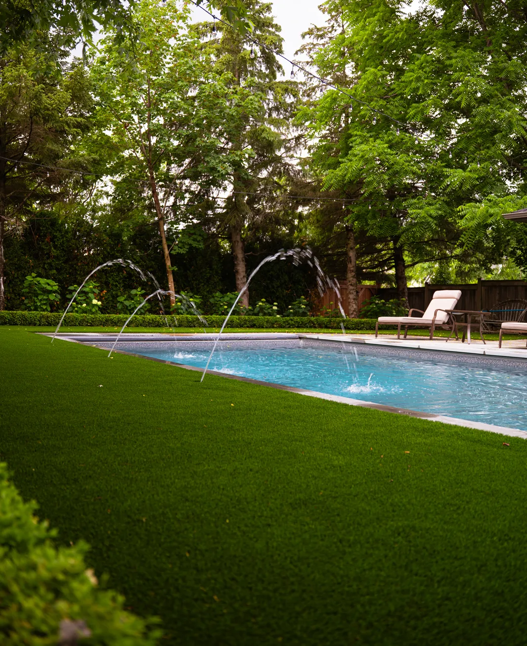 A landscaping, pool coping and interlocking project completed by Mutti Landscaping in Kleinburg, Ontario