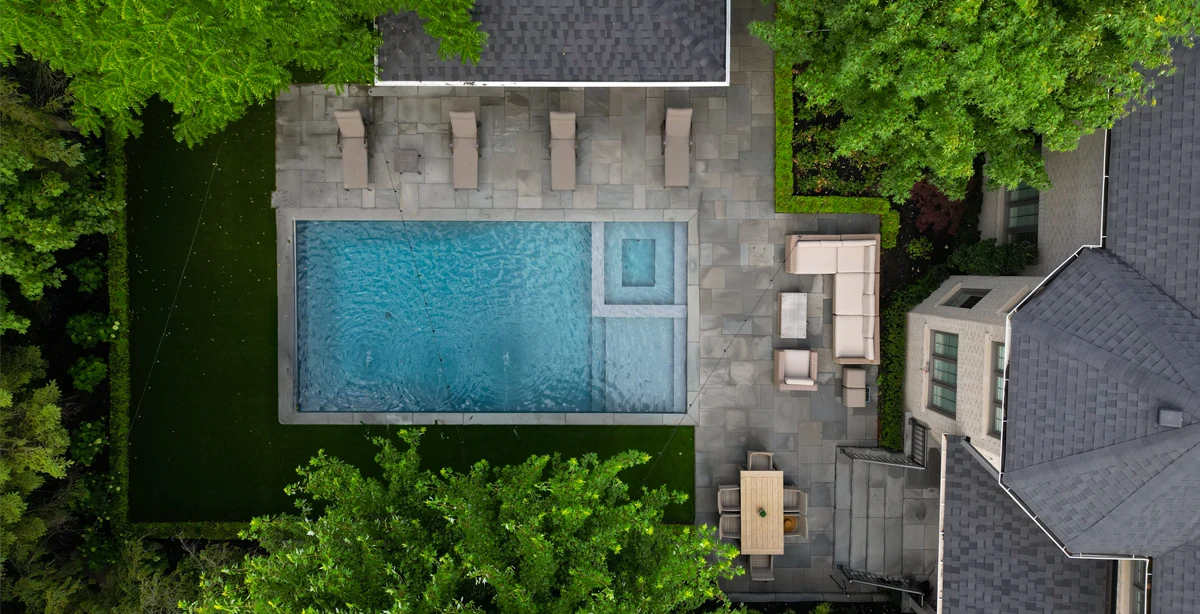 A landscaping, pool coping and interlocking project completed by Mutti Landscaping in Kleinburg, Ontario