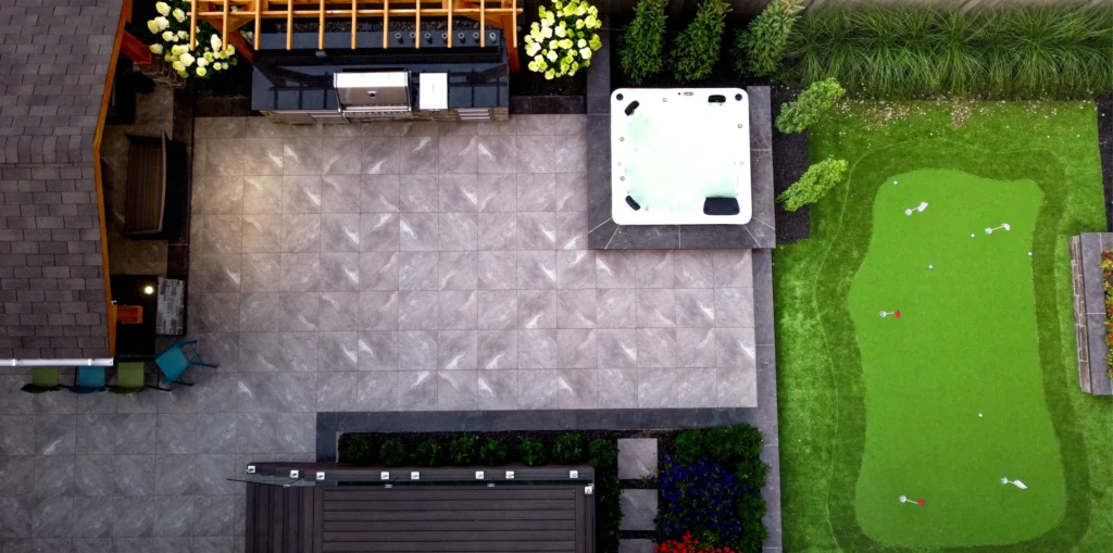 An aerial view of a backyard oasis designed and installed by Mutti Landscaping