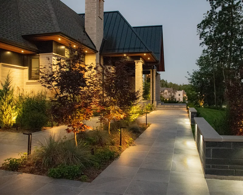 A backyard with landscaping services completed by Mutti Landscaping in the Greater Toronto Area (GTA)