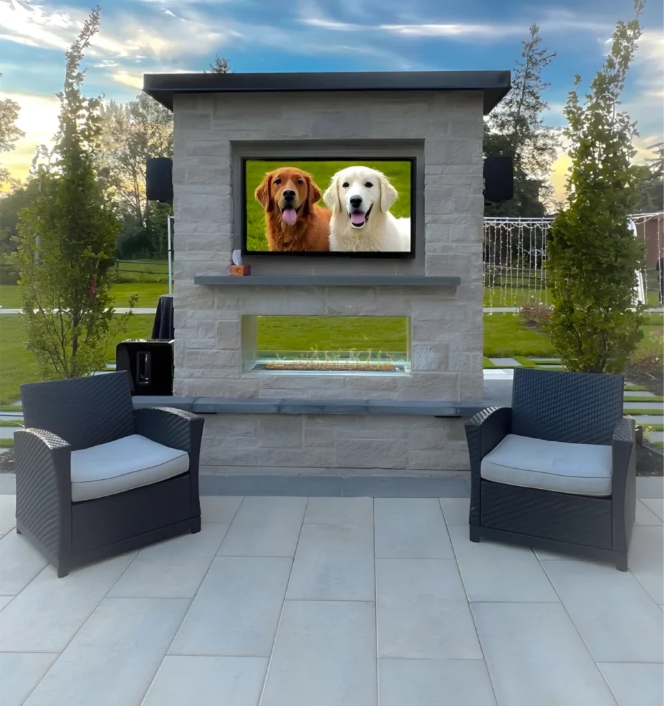 An outdoor TV installed as part of backyard installation services completed by Mutti Landscaping